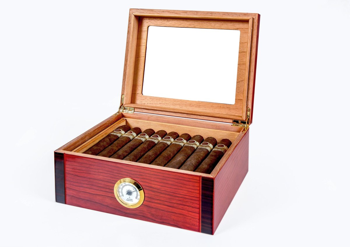 Classic wooden humidor box of cigars